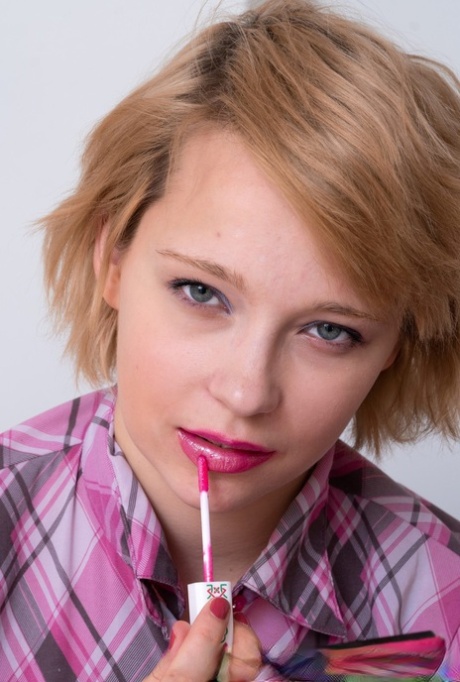 Pretty girl Uli flashes upskirt underwear prior to her nude modelling debut