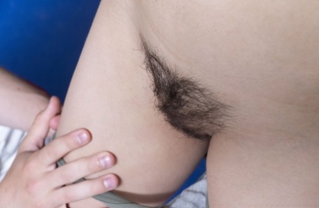 Teen amateur takes a cumshot on her bush after sex with a yoga instructor
