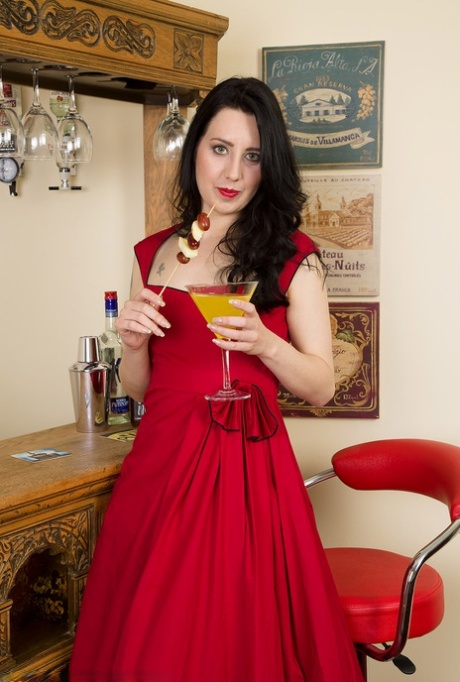 30 plus female Honesty strips to red pumps while enjoying a cocktail