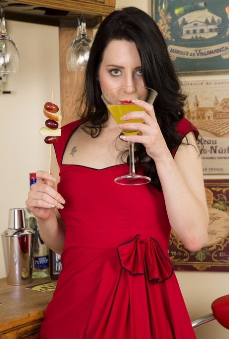 30 plus female Honesty strips to red pumps while enjoying a cocktail
