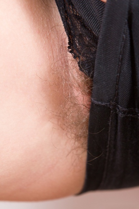Brunette girl with small tits Mary K spreads her hairy beaver in a solo