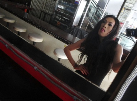 Lusty ladyboy Joy plays with her hairy small cock and toys her booty