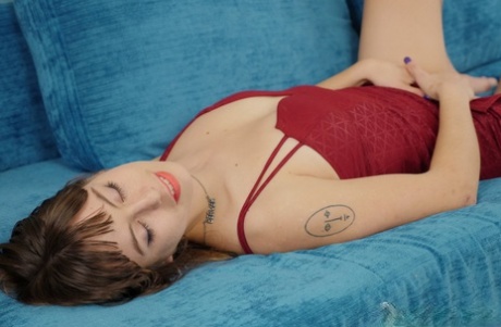 Brunette teen girl Hedera Helix showing her hairy twat and ass on the couch