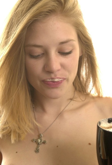 Naked amateur teen Madison spreads her legs wide to show her hairy pussy