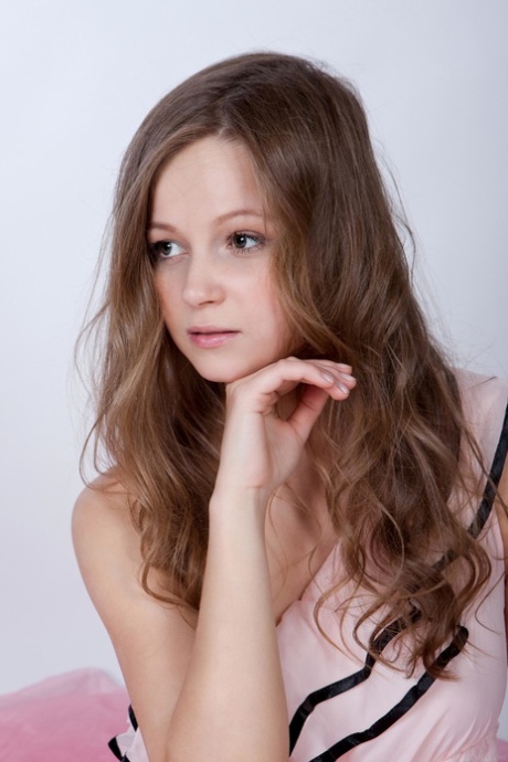 Alluring teen Alexandra D shows her irresistible trimmed pussy up close