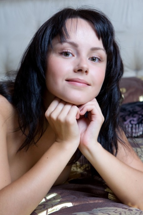 Black haired teen with an adorable face Mirelle A reveals her juggs and bush