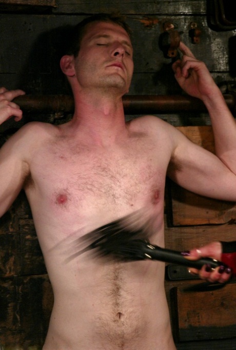 Domina MILF Kym Wilde gives her male sub with a small cock corporal punishment
