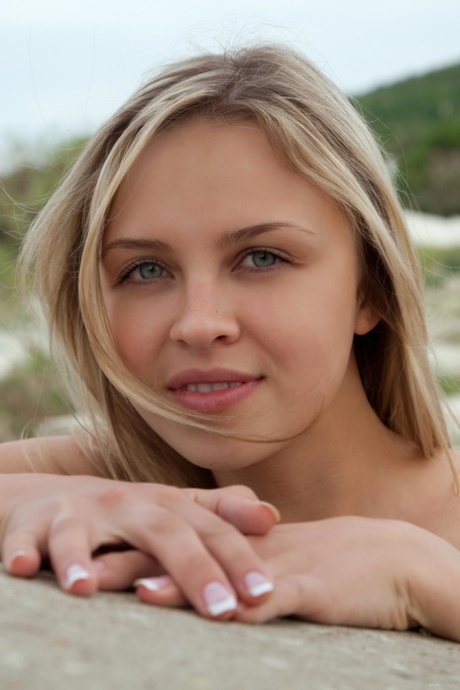 Blonde babe with beautiful eyes Luciana A flaunts her amazing figure