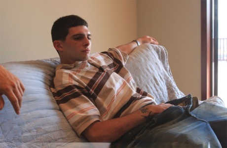Inked stud Anthony Smith leans over and sucks his roommate Lee Stephens's rod