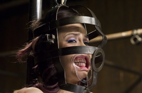 Tiny redheaded Latina Kristina Rose gets bound and brutalized in the dungeon