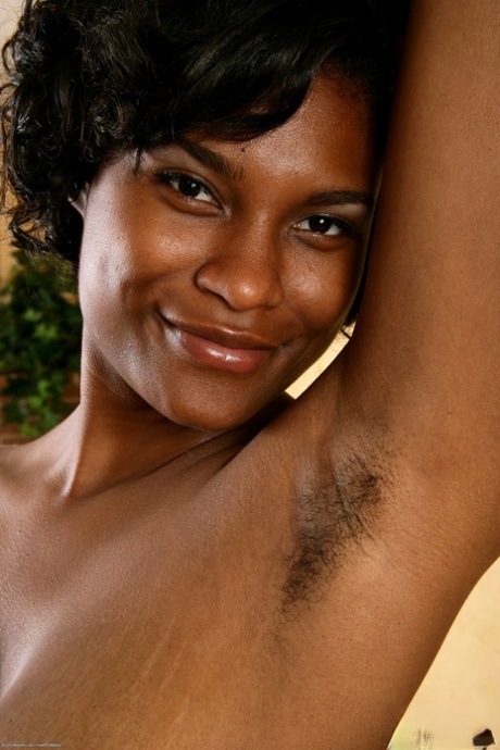 Gorgeous ebony babe Lusty Lala strips her red lingerie & displays her holes