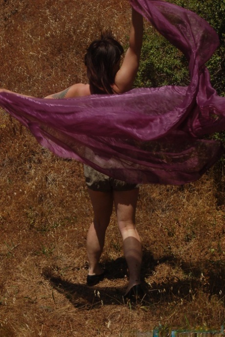 Tall chick Olivia Rose strips in nature and shows her hairy vagina up close