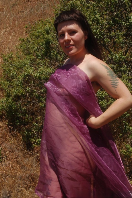 Tall chick Olivia Rose strips in nature and shows her hairy vagina up close