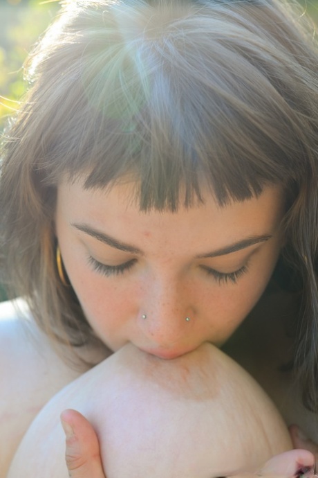 Amateur fatty Magnolia licking her huge natural tits & rubbing her hairy twat