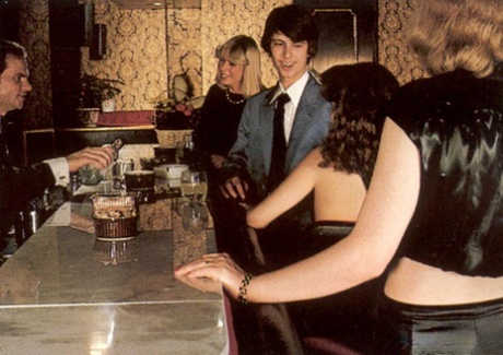 Hot women give blowjobs and get their hairy pussies fucked in a vintage orgy