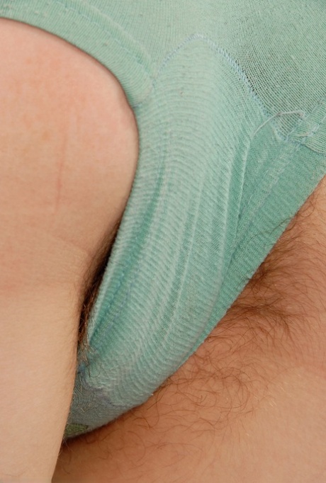 Redheaded babe amateur Agnes flaunts her big tits and hairy love holes