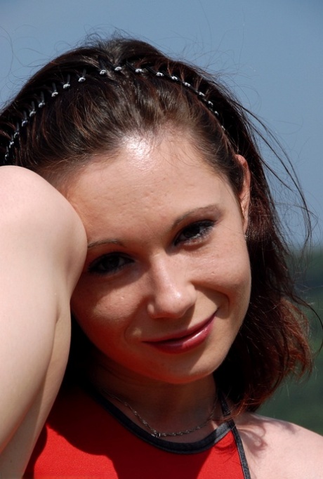 Hot teen babe Tereza playing with her super hairy pussy outdoors