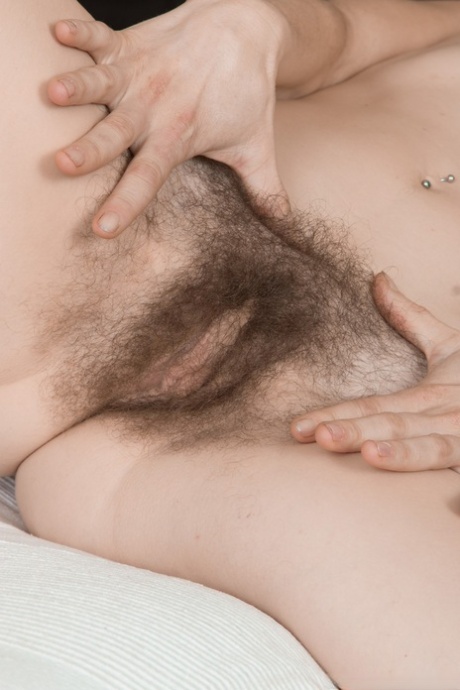 Mature vixen Sunshine showcases every inch of her hairy body and bush